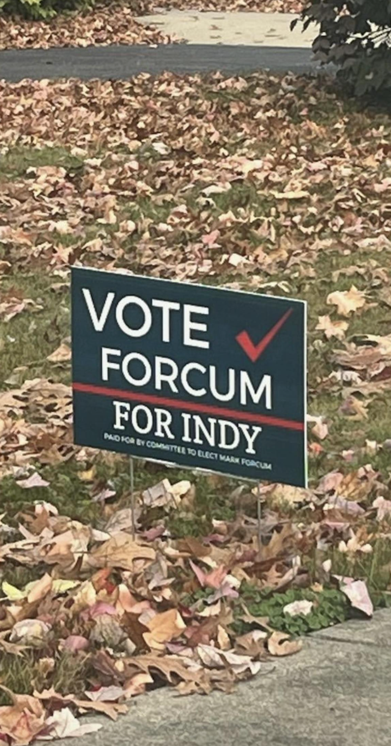 street sign - Vote Forcum For Indy